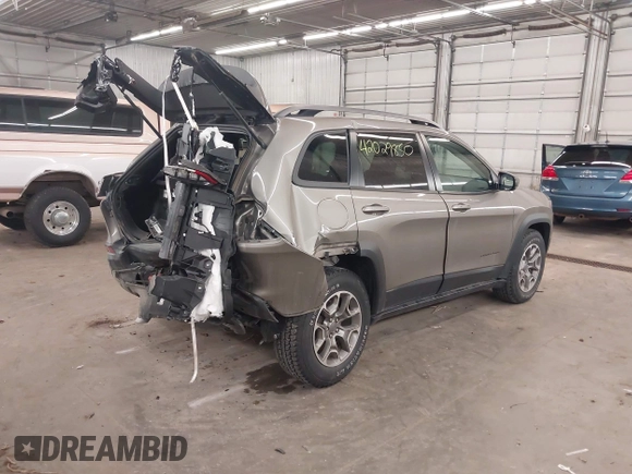 2021 Jeep Cherokee Trailhawk z VIN 1C4PJMBX5MD231018, wystawiony jako IAAI lot #42029850 z przebiegiem 66 525 mil mil oraz . Historia ofert i sprzedaży dostępna na DreamBid. Obrazek 4.
