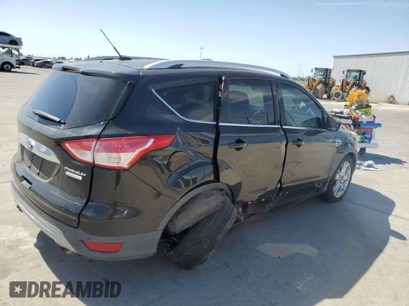 2015 Ford Escape Titanium with VIN 1FMCU0J97FUC80446, listed as a Copart auction lot 58749895 with 106,890 mi miles and Salvage title. Bid and sale history available at DreamBid. Image 3.