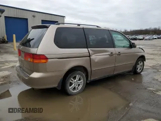 2004 Honda Odyssey EX with VIN 5FNRL186X4B127827, listed as a Copart auction lot 51602565 with 182,127 mi miles and Salvage Title. Bid and sale history available at DreamBid. Image 3.