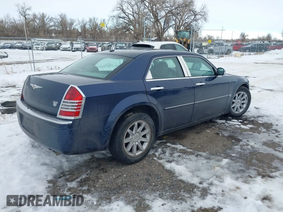 2006 Chrysler 300 C with VIN 2C3LA63H96H289693, listed as a IAAI auction lot 41308366 with 128,814 mi miles. Bid and sale history available at carsss.com. Image 4.
