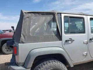 2008 Jeep Wrangler Unlimited X with VIN 1J4GA39198L651172, listed as a IAAI auction lot 41936521 with 69,007 mi miles and . Bid and sale history available at DreamBid. Image 6.