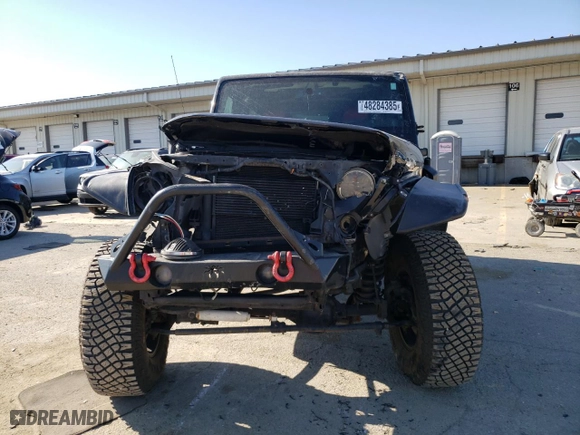 2013 Jeep Wrangler Unlimited Sahara with VIN 1C4BJWEG6DL698827, listed as a Copart auction lot 48284385 with 92,370 mi miles and Salvage Title. Bid and sale history available at carsss.com. Image 5.