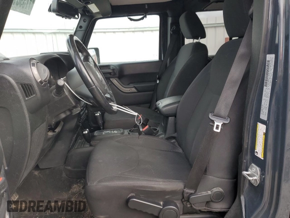 2018 Jeep Wrangler JK Unlimited Sport S with VIN 1C4BJWDG1JL907517, listed as a Copart auction lot 77398184 with 60,217 mi miles and Salvage Title. Bid and sale history available at carsss.com. Image 7.