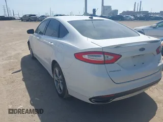 2015 Ford Fusion SE with VIN 3FA6P0H97FR284010, listed as a IAAI auction lot 42092309 with 171,826 mi miles and . Bid and sale history available at DreamBid. Image 3.