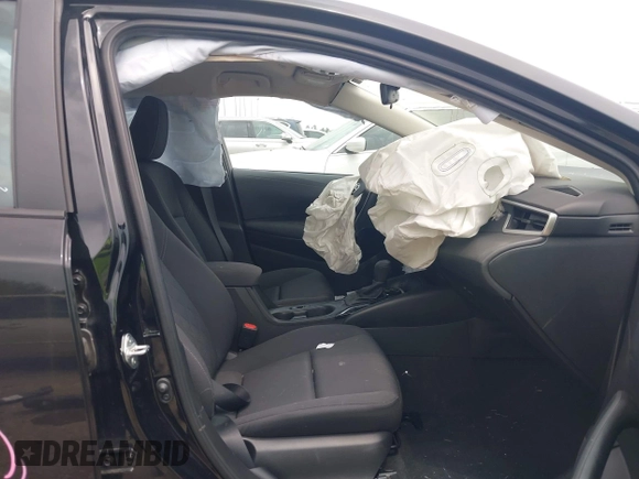 2023 Toyota Corolla LE z VIN 5YFB4MDE7PP060545, wystawiony jako IAAI lot #42379141 z przebiegiem 33 154 mil mil oraz . Historia ofert i sprzedaży dostępna na DreamBid. Obrazek 5.