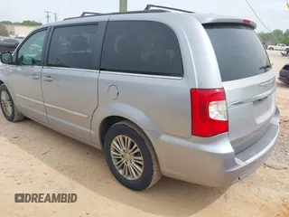 2014 Chrysler Town & Country Touring L with VIN 2C4RC1CG9ER376058, listed as a IAAI auction lot 42099348 with 186,226 mi miles and . Bid and sale history available at DreamBid. Image 3.