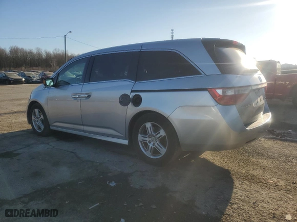 2012 Honda Odyssey Touring with VIN 5FNRL5H92CB019296, listed as a Copart auction lot 86574184 with 215,899 mi miles and Salvage Title. Bid and sale history available at carsss.com. Image 2.