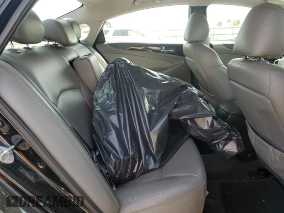 2013 Hyundai Sonata Limited with VIN 5NPEC4AC4DH628200, listed as a Copart auction lot 51311145 with 137,972 mi miles and Salvage Title. Bid and sale history available at carsss.com. Image 10.