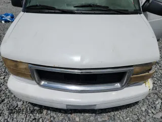 2000 Chevrolet Astro Cargo z VIN 1GCDM19W2YB128890, wystawiony jako Copart lot #59023315 z przebiegiem Nie podano mil oraz Szkoda całkowita • Salvage title. Historia ofert i sprzedaży dostępna na DreamBid. Obrazek 11.