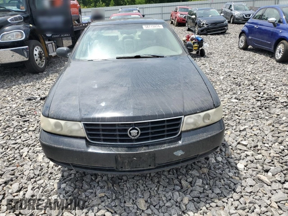 1999 Cadillac Seville z VIN N0V1N, wystawiony jako Copart lot #72249294 z przebiegiem Nie podano mil oraz Nie do naprawy • Non repairable. Historia ofert i sprzedaży dostępna na DreamBid. Obrazek 5.