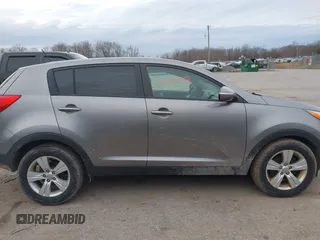 2012 Kia Sportage LX with VIN KNDPB3A28C7332354, listed as a IAAI auction lot 41933058 with 75,938 mi miles. Bid and sale history available at carsss.com. Image 13.