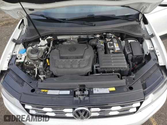 2018 Volkswagen Tiguan S with VIN 3VV0B7AX6JM111232, listed as a Copart auction lot 74944624 with 106,979 mi miles and Salvage Title. Bid and sale history available at DreamBid. Image 11.