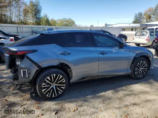 2023 Lexus RZ with VIN JTJAAAAB8PA014561, listed as a Copart auction lot 72955124 with 5,230 mi miles and Salvage Title. Bid and sale history available at carsss.com. Image 3.