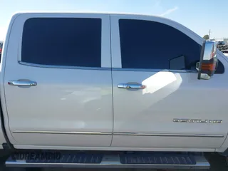2019 GMC Sierra 2500HD Denali with VIN 1GT12SEY8KF139611, listed as a IAAI auction lot 41641028 with 69,776 mi miles. Bid and sale history available at carsss.com. Image 13.