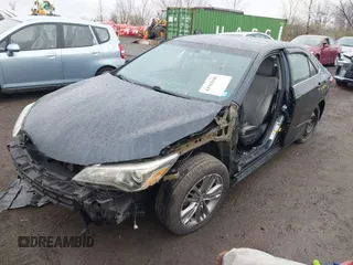 2015 Toyota Camry XLE with VIN 4T1BF1FK1FU087653, listed as a IAAI auction lot 41942940 with 180,274 mi miles. Bid and sale history available at carsss.com. Image 2.