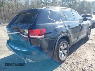2018 Volkswagen Atlas SE z VIN 1V2LR2CA4JC582833, wystawiony jako IAAI lot #41452891 z przebiegiem 122 396 mil mil oraz . Historia ofert i sprzedaży dostępna na DreamBid. Obrazek 4.
