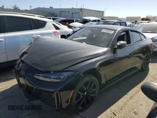 2022 BMW i4 M50 with VIN WBY33AW06NFM16543, listed as a Copart auction lot 52206564 with 11,514 mi miles. Bid and sale history available at carsss.com. Image 1.