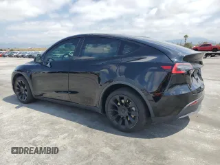 2020 Tesla Model Y Long Range with VIN 5YJYGDEE6LF051549, listed as a Copart auction lot 55063805 with 77,861 mi miles and Salvage Title. Bid and sale history available at DreamBid. Image 2.