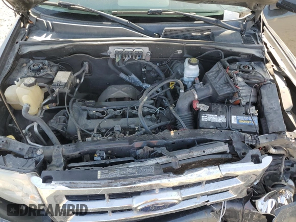 2008 Ford Escape XLS с VIN 1FMCU02Z08KB06103, выставлен на аукционе Copart как лот 60934415 с пробегом Не указан миль и Списание • Salvage title. История ставок и продаж доступна на DreamBid. Изображение 12.