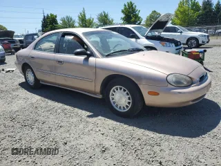 1996 Mercury Sable LS z VIN 1MELM53S8TA610706, wystawiony jako Copart lot #59506535 z przebiegiem 64 513 mil mil oraz Tytuł czysty. Historia ofert i sprzedaży dostępna na DreamBid. Obrazek 4.