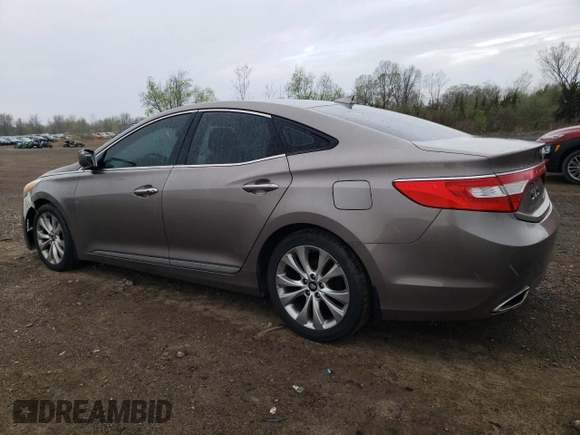 2013 Hyundai Azera z VIN KMHFG4JG7DA216478, wystawiony jako Copart lot #53998885 z przebiegiem 154 277 mil mil oraz Czysty tytuł • Clean title. Historia ofert i sprzedaży dostępna na DreamBid. Obrazek 2.