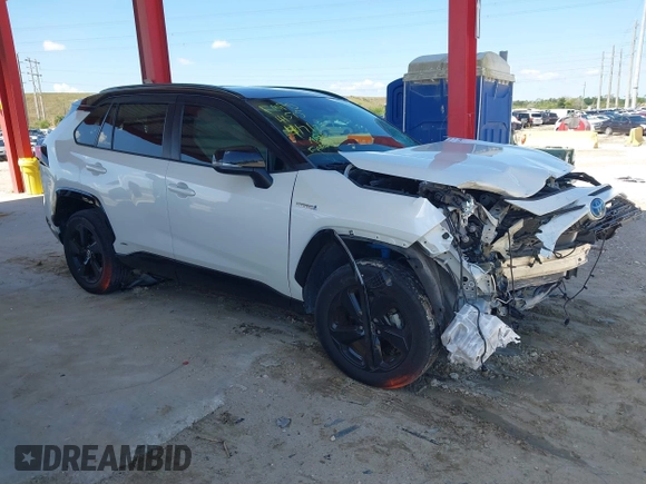 2021 Toyota RAV4 Hybrid XSE with VIN 2T3E6RFV9MW019837, listed as a IAAI auction lot 42002574 with 74,214 mi miles. Bid and sale history available at carsss.com. Image 14.