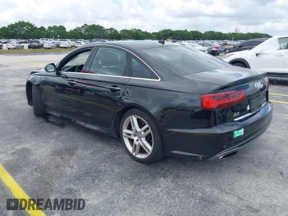 2016 Audi A6 2.0T Premium Plus with VIN WAUGFAFC6GN055826, listed as a IAAI auction lot 42011778 with 98,210 mi miles. Bid and sale history available at carsss.com. Image 3.