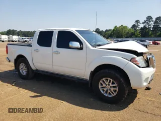 2016 Nissan Frontier S with VIN 1N6AD0EV4GN774095, listed as a Copart auction lot 51939555 with 218,471 mi miles and Salvage title. Bid and sale history available at DreamBid. Image 4.