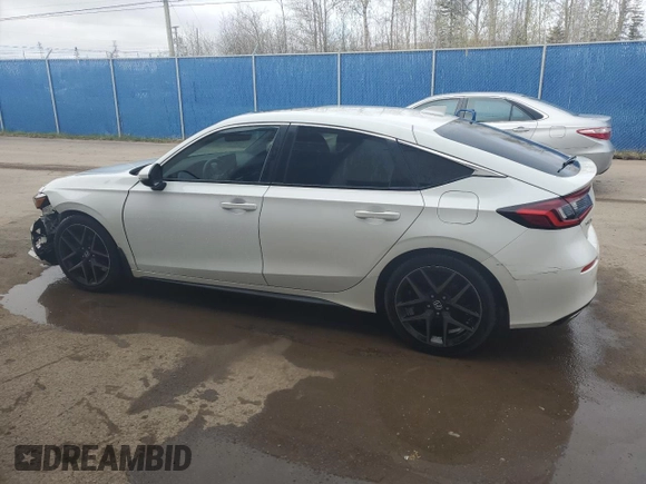 2022 Honda Civic Sport Touring z VIN 19XFL1G89NE400298, wystawiony jako Copart lot #56561415 z przebiegiem 81 456 mil mil oraz Czysty tytuł • Clean title. Historia ofert i sprzedaży dostępna na DreamBid. Obrazek 2.