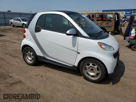 2014 Smart fortwo Pure z VIN WMEEJ3BA5EK779399, wystawiony jako Copart lot #59279785 z przebiegiem 117 204 mil mil oraz Czysty tytuł • Clean title. Historia ofert i sprzedaży dostępna na DreamBid. Obrazek 4.