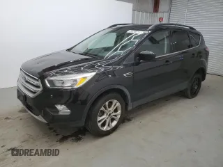 2018 Ford Escape SE z VIN 1FMCU9GD9JUD21474, wystawiony jako Copart lot #53921535 z przebiegiem 136 819 mil mil oraz Czysty tytuł • Clean title. Historia ofert i sprzedaży dostępna na DreamBid. Obrazek 1.