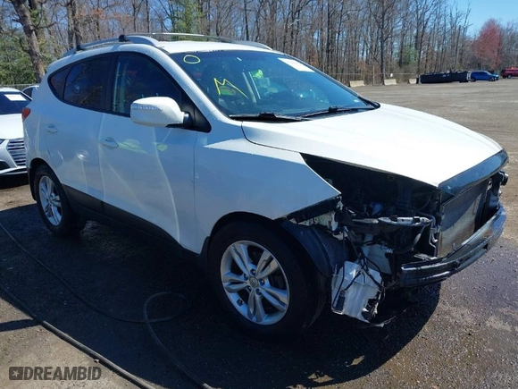2013 Hyundai Tucson GLS with VIN KM8JU3AC6DU646866, listed as a IAAI auction lot 41846665 with 156,779 mi miles. Bid and sale history available at carsss.com. Image 1.