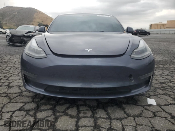2022 Tesla Model 3 Long Range with VIN 5YJ3E1EB9NF117339, listed as a Copart auction lot 55659415 with 87,479 mi miles and Salvage Title. Bid and sale history available at DreamBid. Image 5.