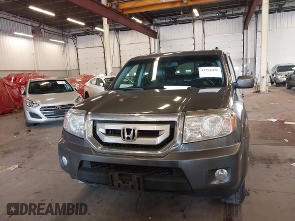 2011 Honda Pilot EX-L with VIN 5FNYF4H65BB020721, listed as a IAAI auction lot 41794436 with 113,630 mi miles and . Bid and sale history available at carsss.com. Image 12.