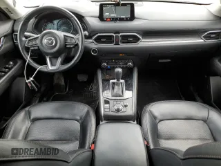 2021 Mazda CX-5 Grand Touring with VIN JM3KFBDM7M1122281, listed as a Copart auction lot 54576485 with 93,008 mi miles and Salvage Title. Bid and sale history available at DreamBid. Image 8.