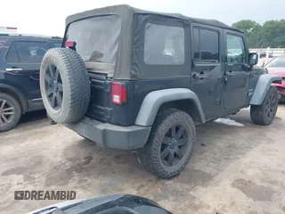 2014 Jeep Wrangler Unlimited Sport with VIN 1C4BJWDG0EL290441, listed as a IAAI auction lot 42204434 with 138,367 mi miles and . Bid and sale history available at DreamBid. Image 4.