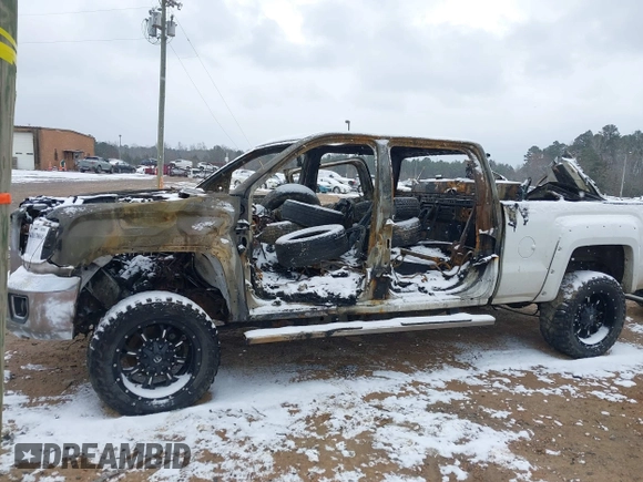 2015 GMC Sierra 2500HD SLT z VIN 1GT12ZE85FF604070, wystawiony jako IAAI lot #41617860 z przebiegiem Nie podano mil oraz . Historia ofert i sprzedaży dostępna na DreamBid. Obrazek 6.
