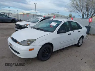 2004 Ford Focus SE with VIN 1FAFP34394W199845, listed as a IAAI auction lot 41896239 with 98,464 mi miles and . Bid and sale history available at DreamBid. Image 2.