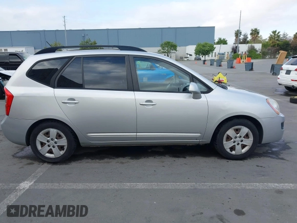 2009 Kia Rondo LX with VIN KNAFG528497222225, listed as a IAAI auction lot 42108192 with 113,040 mi miles. Bid and sale history available at carsss.com. Image 14.