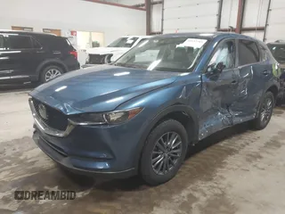 2019 Mazda CX-5 Touring with VIN JM3KFBCM1K0584369, listed as a IAAI auction lot 41657765 with 77,934 mi miles. Bid and sale history available at carsss.com. Image 2.