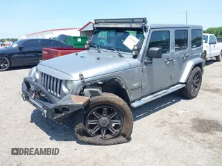 2013 Jeep Wrangler Unlimited Sahara with VIN 1C4BJWEG4DL666930, listed as a IAAI auction lot 42310569 with 206,577 mi miles and . Bid and sale history available at DreamBid. Image 17.