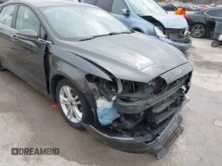 2018 Ford Fusion SE with VIN 3FA6P0H74JR125727, listed as a IAAI auction lot 41661939 with 100,446 mi miles. Bid and sale history available at carsss.com. Image 6.