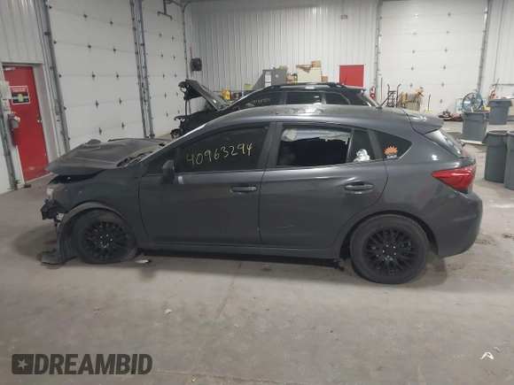 2018 Subaru Impreza with VIN 4S3GTAA65J3713216, listed as a IAAI auction lot 40963294 with 94,176 mi miles and . Bid and sale history available at DreamBid. Image 14.