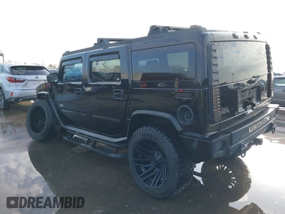 2003 Hummer H2 z VIN 5GRGN23UX3H112173, wystawiony jako IAAI lot #41093359 z przebiegiem Nie podano mil oraz . Historia ofert i sprzedaży dostępna na DreamBid. Obrazek 3.