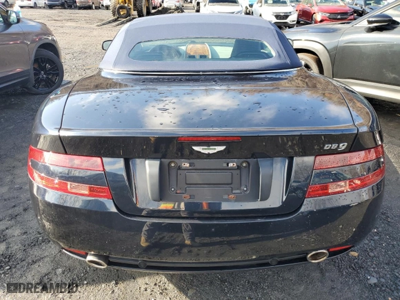 2009 Aston Martin DB9 with VIN SCFAD02E79GB10991, listed as a Copart auction lot 85487894 with 0 mi miles and Salvage Title. Bid and sale history available at carsss.com. Image 6.