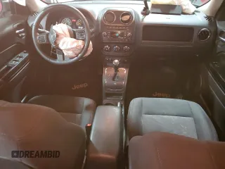2014 Jeep Patriot Latitude with VIN 1C4NJRFB7ED855780, listed as a Copart auction lot 57246515 with 110,433 mi miles and Salvage title. Bid and sale history available at DreamBid. Image 8.