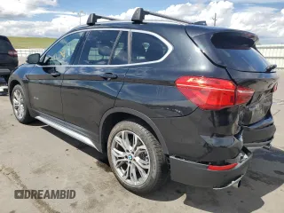 2017 BMW X1 xDrive28i with VIN WBXHT3Z38H4A58005, listed as a Copart auction lot 55837805 with 50,318 mi miles and Salvage title. Bid and sale history available at DreamBid. Image 2.