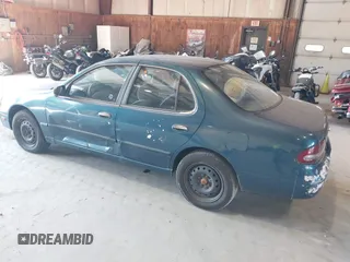1996 Nissan Altima XE with VIN 1N4BU31D4TC139105, listed as a IAAI auction lot 40241213 with 115,817 mi miles and . Bid and sale history available at DreamBid. Image 3.