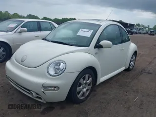 2003 Volkswagen New Beetle Coupe GLS with VIN 3VWCD21C23M427717, listed as a IAAI auction lot 42110553 with 123,396 mi miles. Bid and sale history available at carsss.com. Image 2.