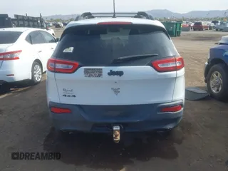 2014 Jeep Cherokee Latitude with VIN 1C4PJMCS7EW298115, listed as a IAAI auction lot 41605052 with 184,773 mi miles and . Bid and sale history available at DreamBid. Image 16.
